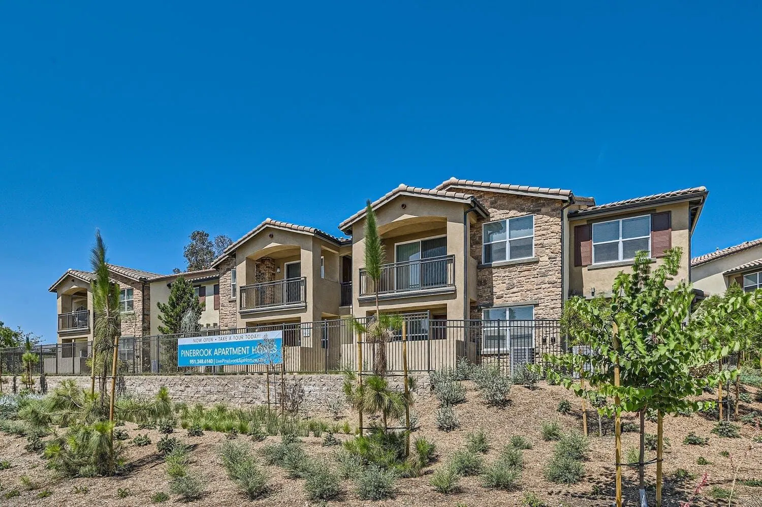 Pinebrook apartment homes and landscaped frontage